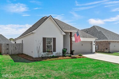 View of front of property featuring a front yard, 