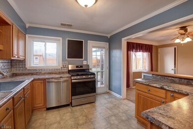 KITCHEN DOOR PROVIDES EASY ACCESS TO BACK YARD PAT