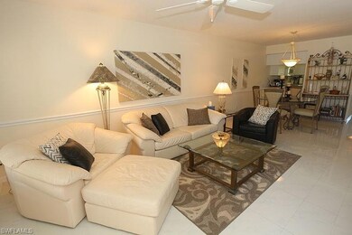 Living room featuring ceiling fan