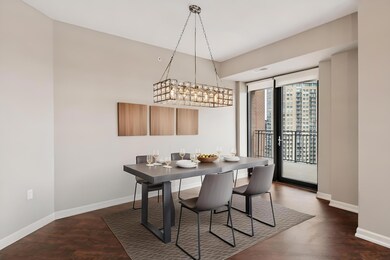 Dining room with access to the primary deck with gas grill perfect for cooking.