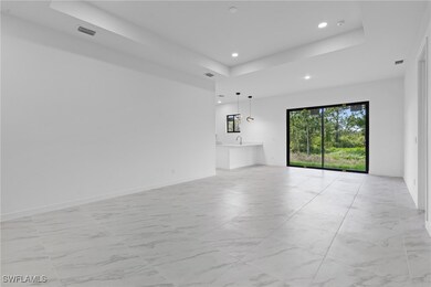 Unfurnished living room with recessed lighting, ma