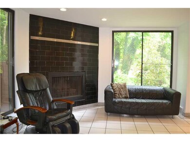 Family Room. Bring the outdoors in with walls of g
