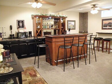 A separate bar area provides a great place for friends and family.