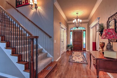 The Foyer is sure to impress with Tall Ceiling, De