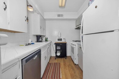 Kitchen featuring light hardwood / wood-style floo