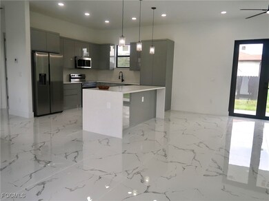 2607 E 18th St, Lehigh Acres, FL 33972 - photo 3