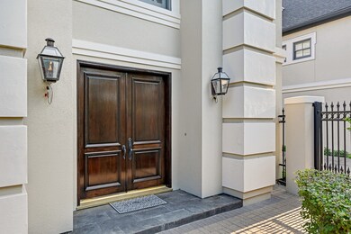 Welcome to the front entrance! Two gas lanterns li