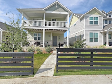 Multi unit property featuring covered porch and a
