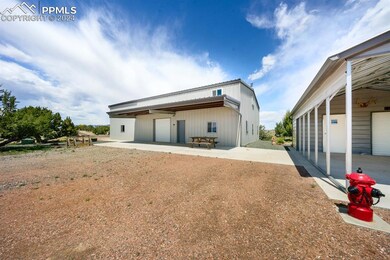 Back of house with a patio area