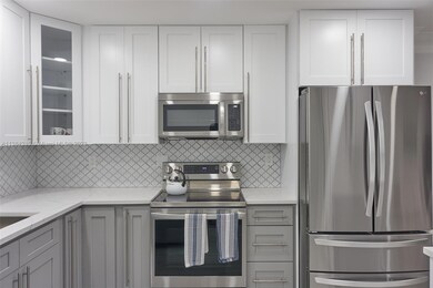 6095 N Sabal Palm Blvd unit 305, Tamarac, FL 33319 - photo 3