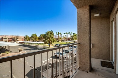 Balcony off the living room featuring a residentia