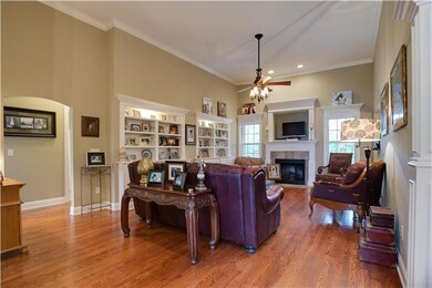 Plenty of space Beautiful Hardwoods right of Kitchen and Dining Room making it great for entertaining!  You will love the Zoned Floor Plan and upgraded Fixtures throughout home!