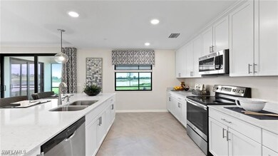 Kitchen featuring appliances with stainless steel