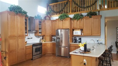 Custom Kitchen with Corian countertops, breakfast 