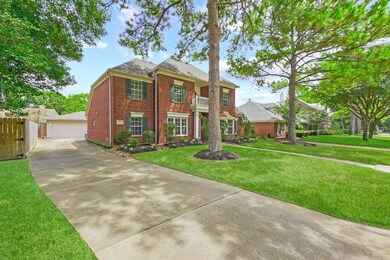 Long extended driveway with 2 car garage allows fo