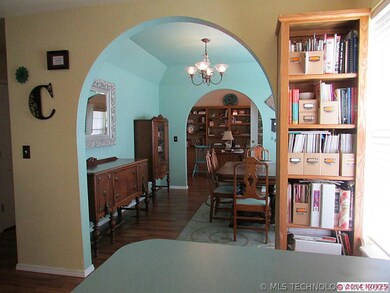 Look at the details!  Built in bookcases and arche