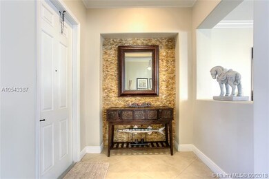 Entrance Foyer w/ Stone Decorative Wall