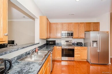 Wood floors, oak cabinetry and new dishwasher, sto