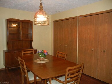 Beautiful dining room with new laminate flooring, 