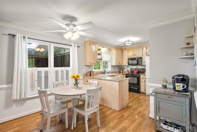 Eat-in kitchen with granite counters, light cabine