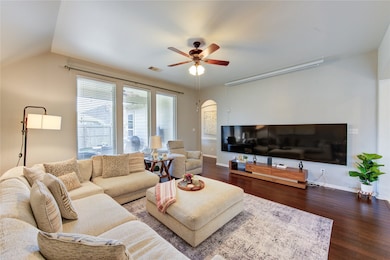 The living room offers a comfortable and inviting