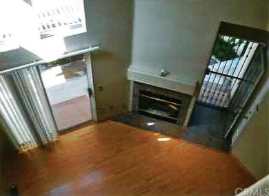 Living room view from upstairs hallway.