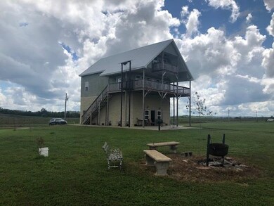 This beautiful home over looks the Tn River.