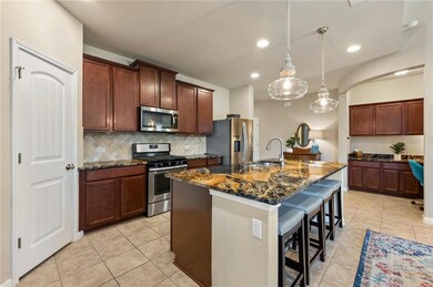Kitchen featuring stainless steel appliances, a k