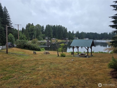 Buy the lot and pay your dues -  have access to this private park across the street.