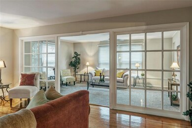 Two glass paned dividers flank the large opening b
