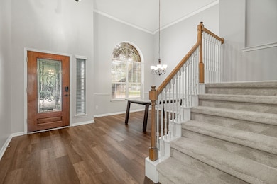 Entryway with formal dining or flex space that could be used as an office.