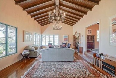 The living room is a grand room with hardwood floo