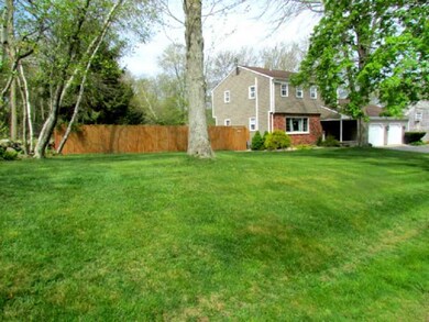 Exterior Front. Nestled on a beautifully landscape
