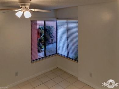 Eat in kitchen area off kitchen, tiled.