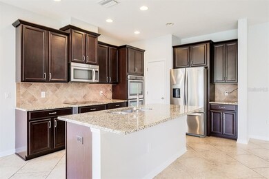 Open Kitchen with granite counter tops, wood cabin