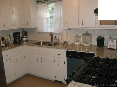 New stainless sink, faucet, subway tile backsplash