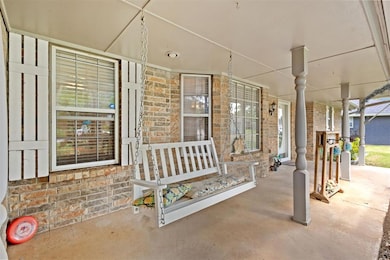 View of patio with a porch