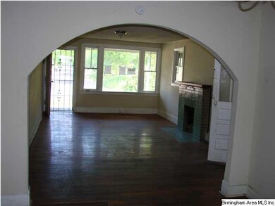 View from dining room to living room and front doo