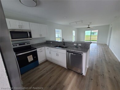 6950 San Benito Dr, Sebring, FL 33872 - photo 5