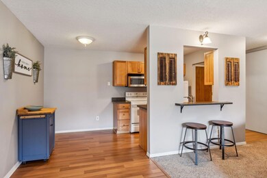 Notice the breakfast bar with a convenient pass-thru window.