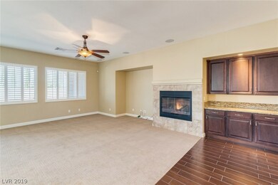 Great Room w/Gas Fireplace and Built-in Bookcase.
