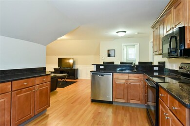 Kitchen view from unit entryway.