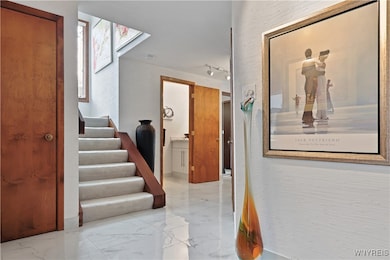 Front Entrance showing half bath
