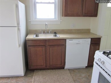 Nice, nice cabinets and a dishwasher too!