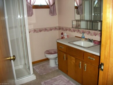 Full bath off family room areas.