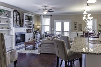 Kitchen and great room in a similar home.