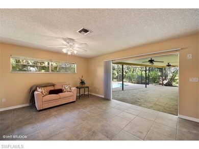 Family Room/Great Room also opens up to lanai