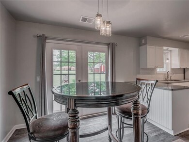 Eat in Kitchen with back yard access.