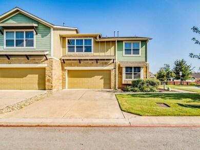 Townhome / multi-family property featuring board 