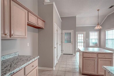 Laundry Closet with plant ledge above to left and 